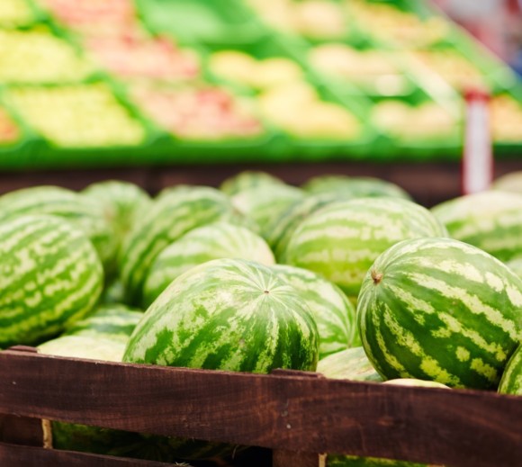 Stack of watermelons in a grocery store